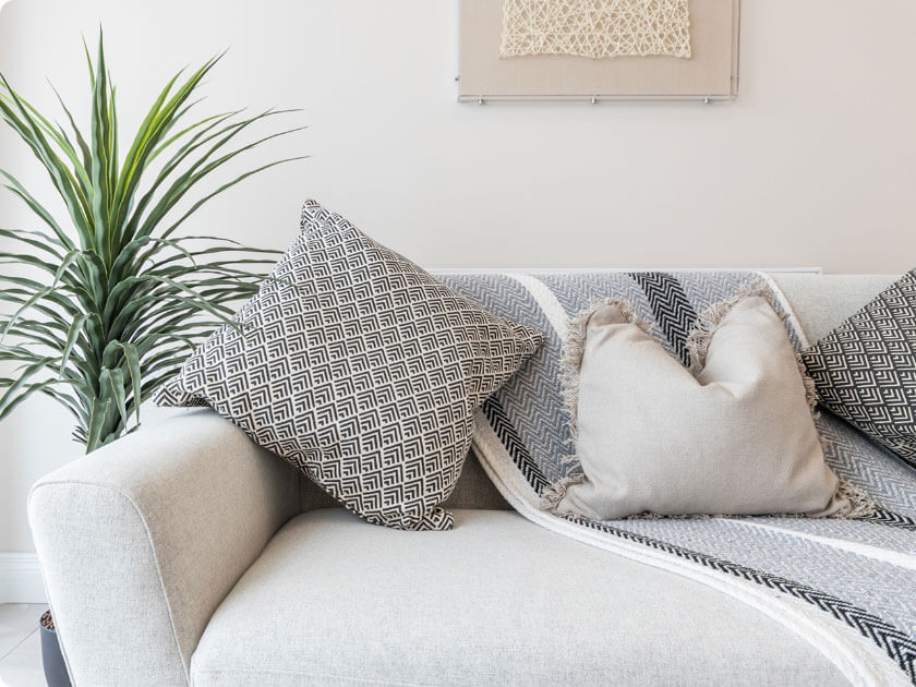 Patterend cushion on white sofa